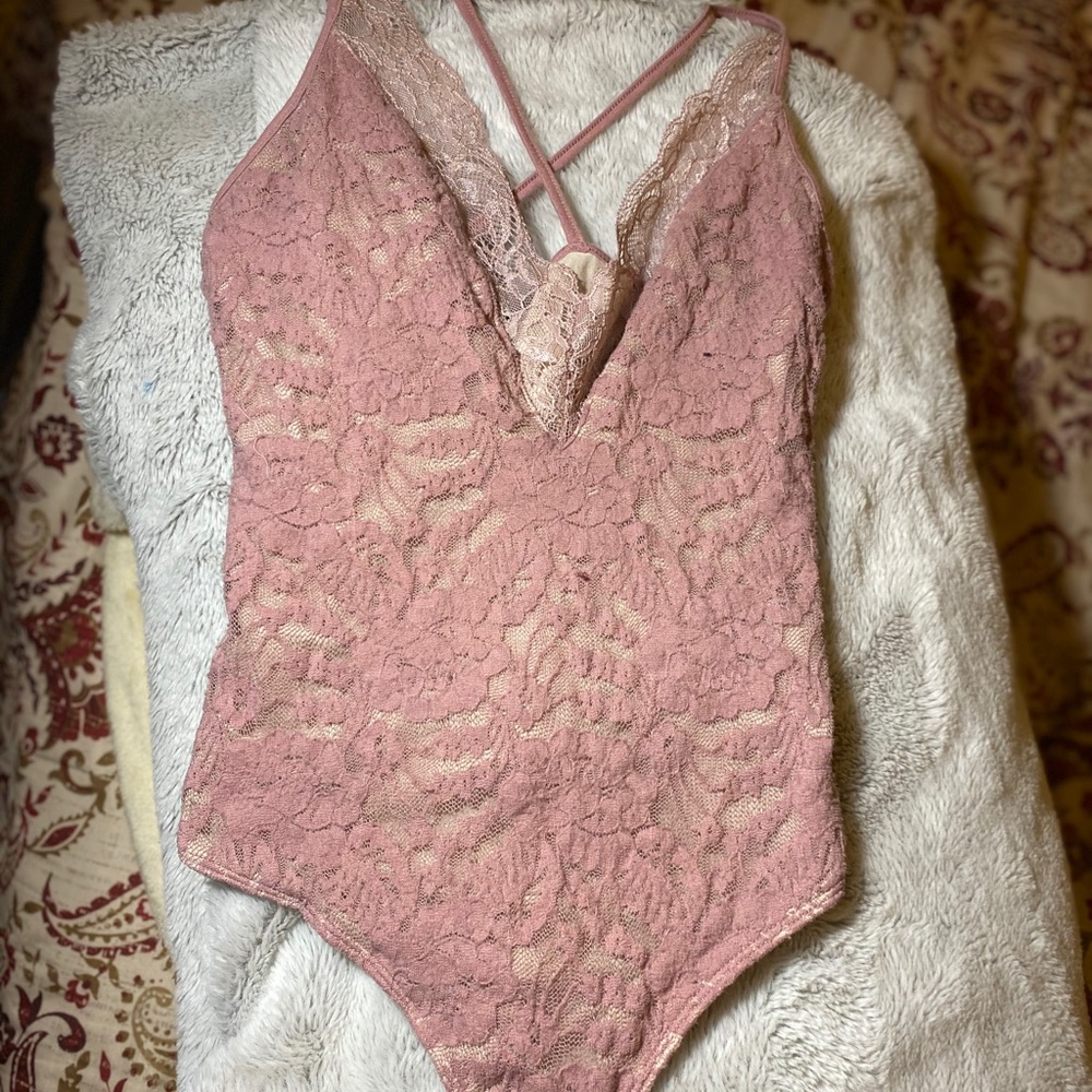 pink lace bodysuit.